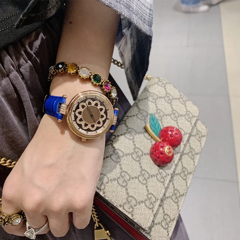 Flower Pattern Rotatable Dial Women's Watch