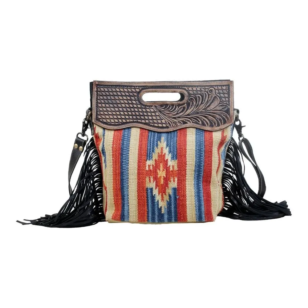 Impactful Hand-Tooled Bag