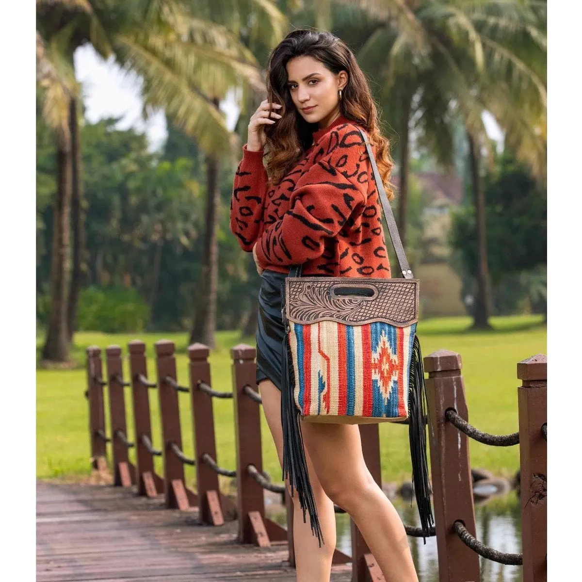 Impactful Hand-Tooled Bag