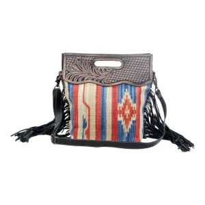 Impactful Hand-Tooled Bag