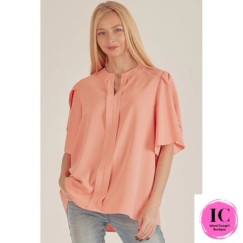 See You Out Light Coral Ruffled Blouse